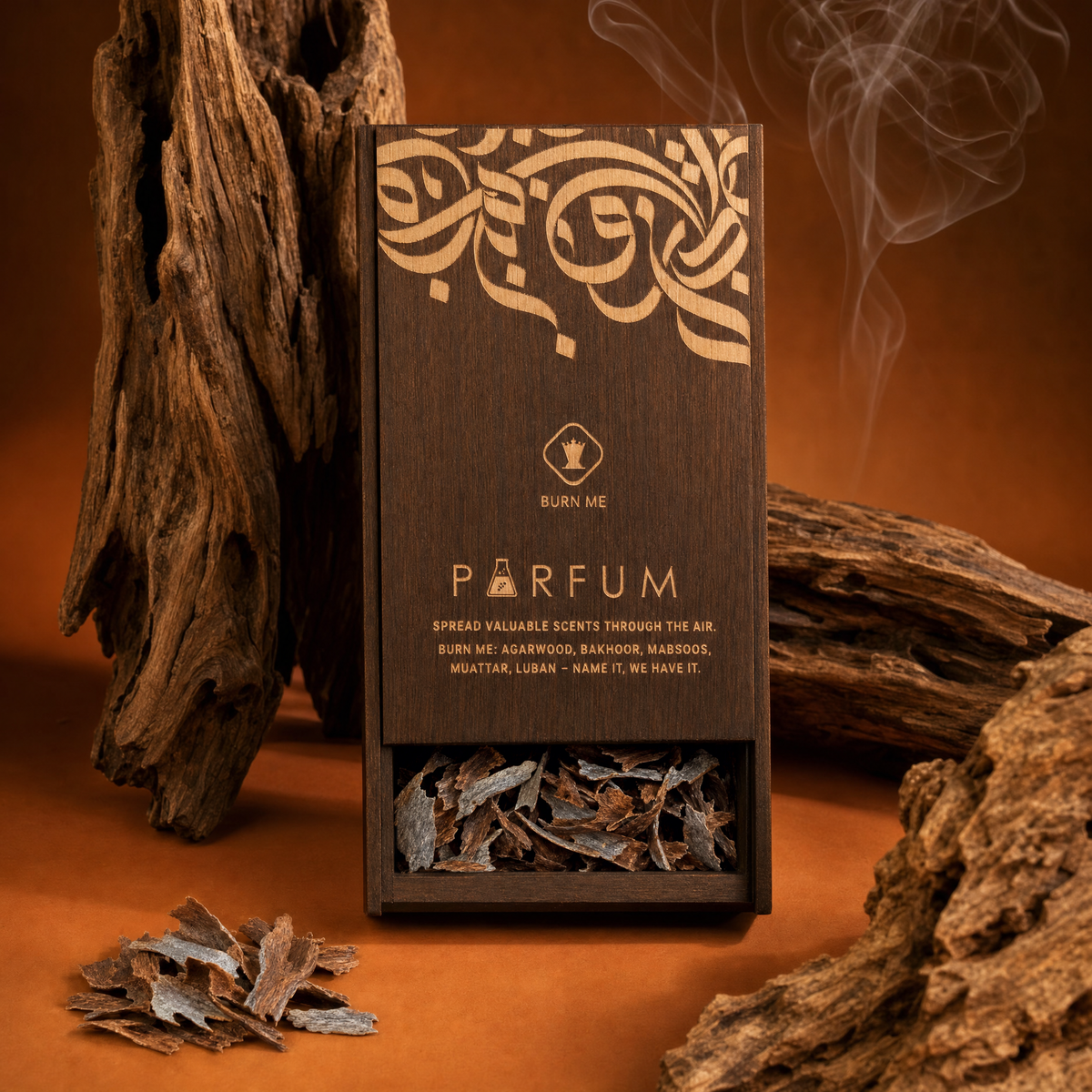 Oud Chuck agarwood flakes in the PARFUM Burn Me wooden gift box